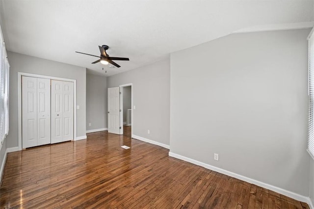 3543 Flora Ave, Kansas City, MO 64109 - unfurnished bedroom featuring wood finished floors, a closet, and ceiling fan