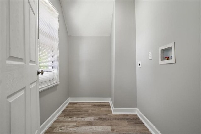 3543 Flora Ave, Kansas City, MO 64109 - laundry room featuring hookup for a washing machine, hookup for an electric dryer, and wood finished floors
