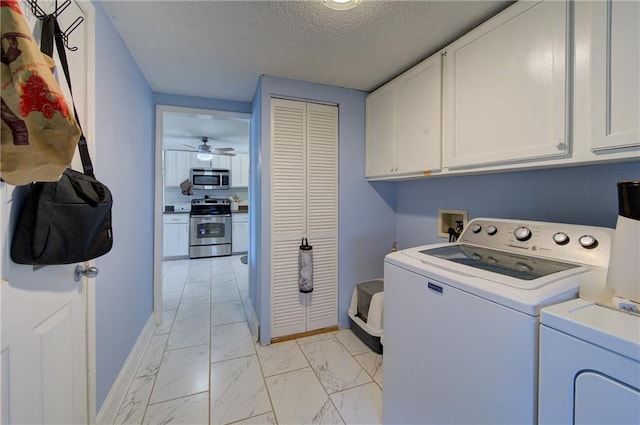3136 S 8th St, Kansas City, KS 66103 - laundry room with cabinet space, washer and dryer, light marble finish floors, a textured ceiling, and ceiling fan