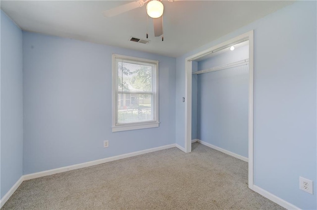 3136 S 8th St, Kansas City, KS 66103 - unfurnished bedroom with carpet floors, a closet, and a ceiling fan