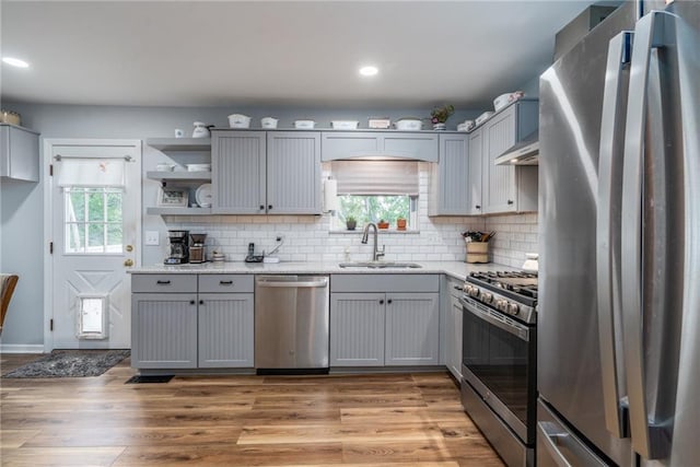 303 W S St, Spring Hill, KS 66083 - kitchen featuring stainless steel appliances, gray cabinets, light wood finished floors, and recessed lighting