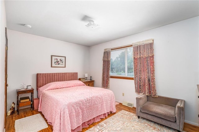 303 W S St, Spring Hill, KS 66083 - bedroom featuring wood finished floors