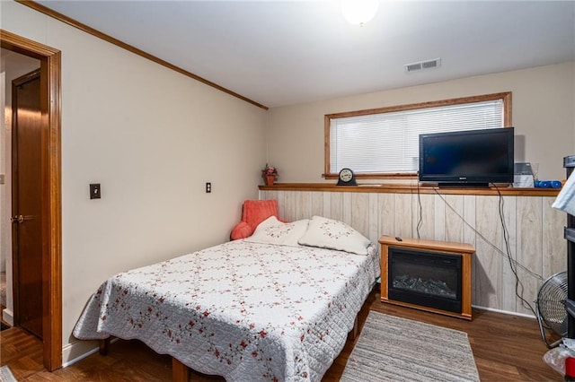 303 W S St, Spring Hill, KS 66083 - bedroom with wood finished floors and crown molding
