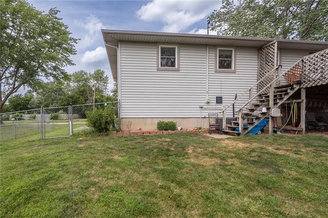 303 W S St, Spring Hill, KS 66083 - back of house with stairs and a gate