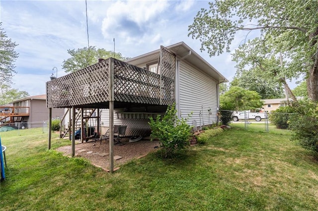 303 W S St, Spring Hill, KS 66083 - rear view of house featuring stairs, a wooden deck, and a gate