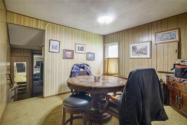 502 N Tennessee St, Iola, KS 66749 - dining room featuring carpet floors and baseboards