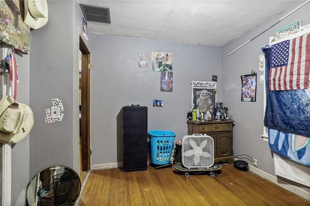 502 N Tennessee St, Iola, KS 66749 - bedroom with wood finished floors and baseboards