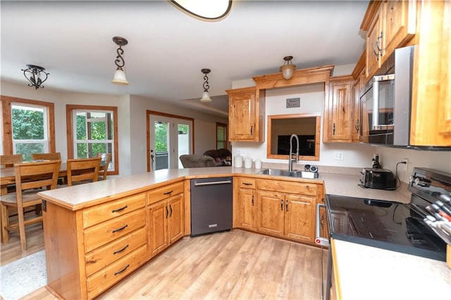29309 E State Route B, Archie, MO 64725 - kitchen with electric range, dishwasher, stainless steel microwave, and plenty of natural light
