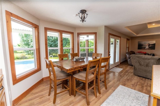 29309 E State Route B, Archie, MO 64725 - dining area featuring healthy amount of natural light and light wood finished floors