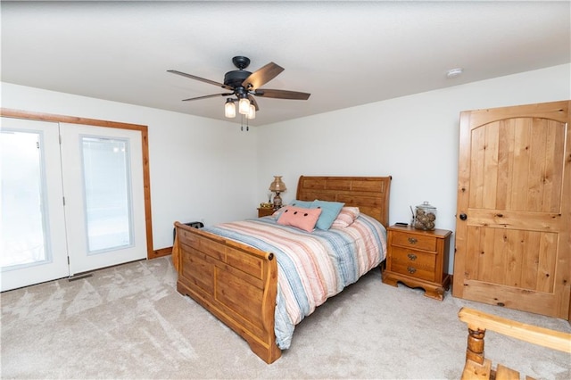 29309 E State Route B, Archie, MO 64725 - bedroom with light carpet, ceiling fan, and access to outside