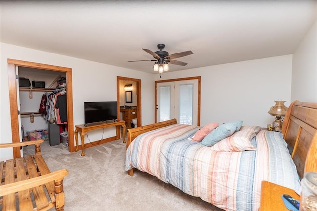 29309 E State Route B, Archie, MO 64725 - bedroom with light carpet, a spacious closet, and a ceiling fan