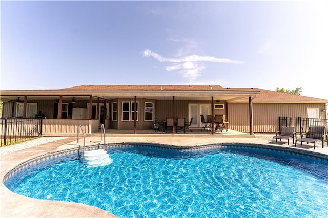 29309 E State Route B, Archie, MO 64725 - view of swimming pool with a patio area, ceiling fan, and outdoor dining space