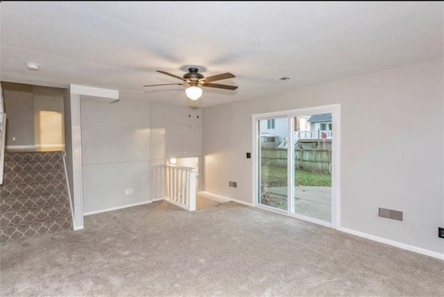 127 E Nelson Cir, Olathe, KS 66061 - empty room with ceiling fan and carpet floors