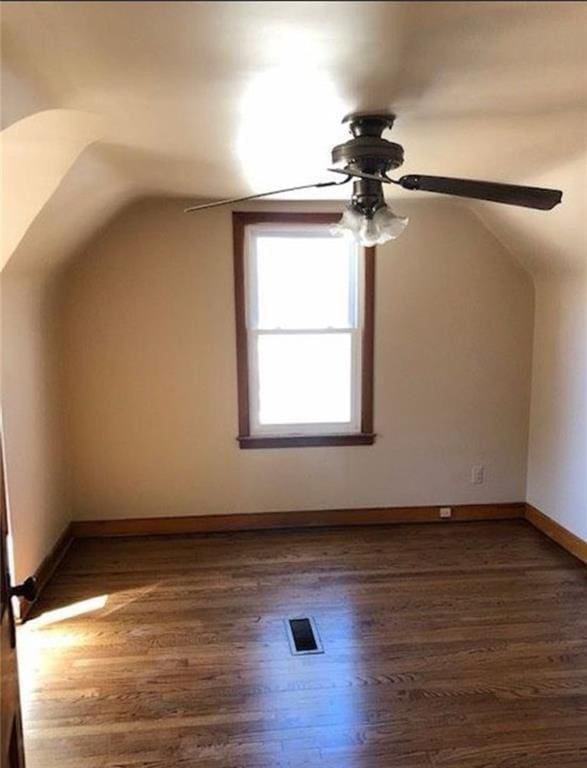 10216 W 60th Ter, Shawnee, KS 66203 - bonus room featuring vaulted ceiling, ceiling fan, and wood finished floors