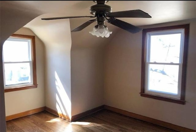 10216 W 60th Ter, Shawnee, KS 66203 - additional living space with healthy amount of natural light, wood finished floors, ceiling fan, and lofted ceiling