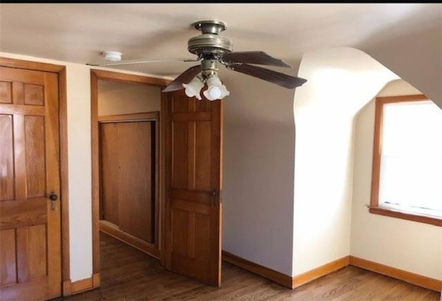 10216 W 60th Ter, Shawnee, KS 66203 - unfurnished bedroom with light wood-style floors, a closet, and ceiling fan