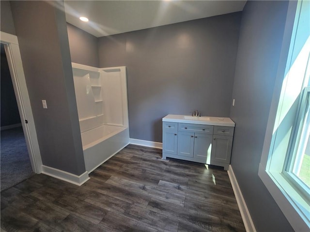 2113 Jefferson St, Lexington, MO 64067 - bathroom featuring vanity, wood finished floors, and shower / washtub combination