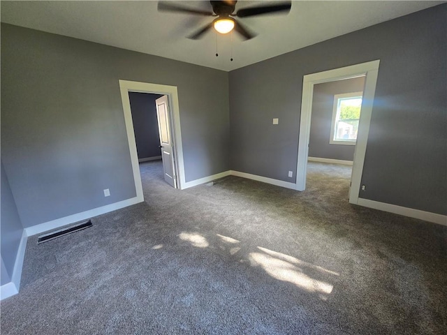 2113 Jefferson St, Lexington, MO 64067 - spare room featuring ceiling fan and carpet