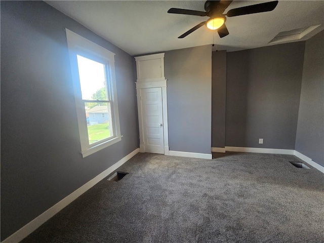 2113 Jefferson St, Lexington, MO 64067 - unfurnished bedroom with carpet floors and a ceiling fan