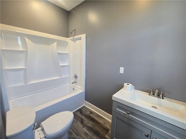 2113 Jefferson St, Lexington, MO 64067 - full bath featuring wood finished floors, vanity, and shower / bath combination