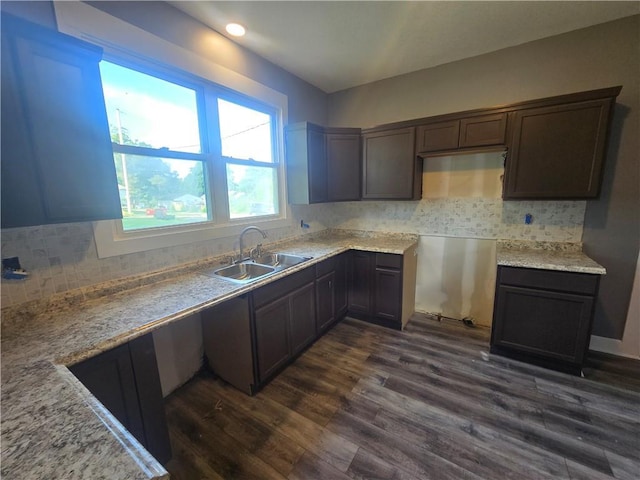 2113 Jefferson St, Lexington, MO 64067 - kitchen featuring dark wood-style flooring, tasteful backsplash, and dark brown cabinetry