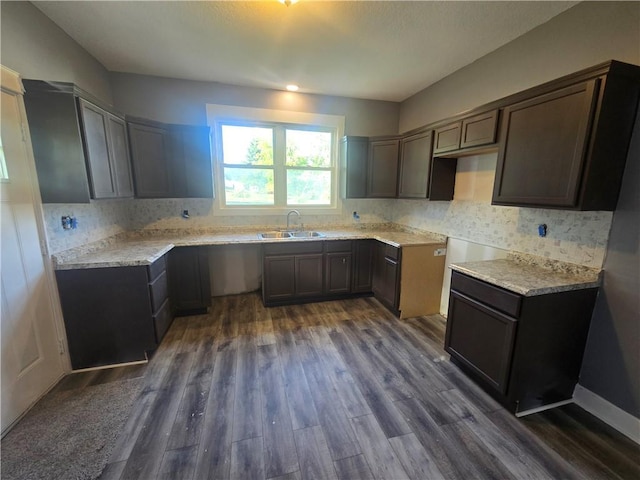 2113 Jefferson St, Lexington, MO 64067 - kitchen featuring dark wood-style flooring and decorative backsplash
