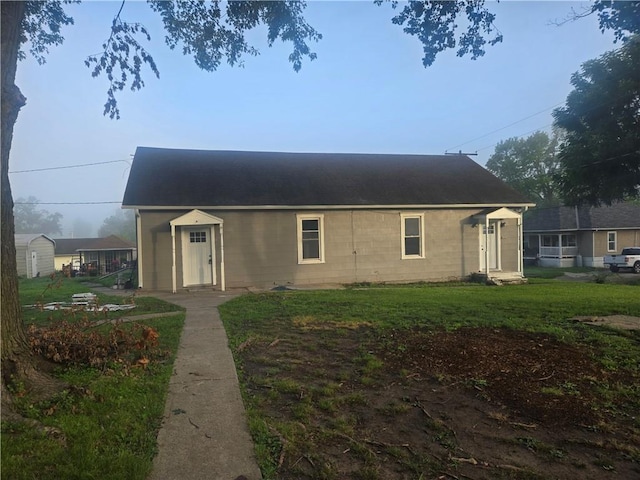 2113 Jefferson St, Lexington, MO 64067 - view of front of property featuring a front yard and a shingled roof