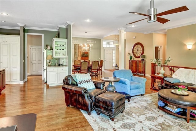 14780 S Glen Eyrie St, Olathe, KS 66061 - living room featuring light wood-style flooring, ceiling fan, a chandelier, crown molding, and recessed lighting