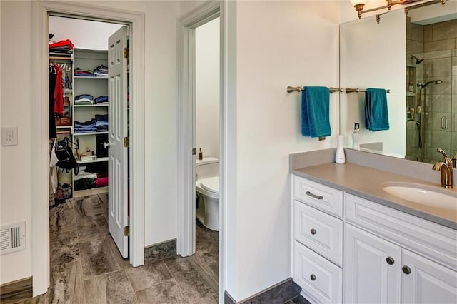 14780 S Glen Eyrie St, Olathe, KS 66061 - full bath with a shower stall, a walk in closet, and vanity