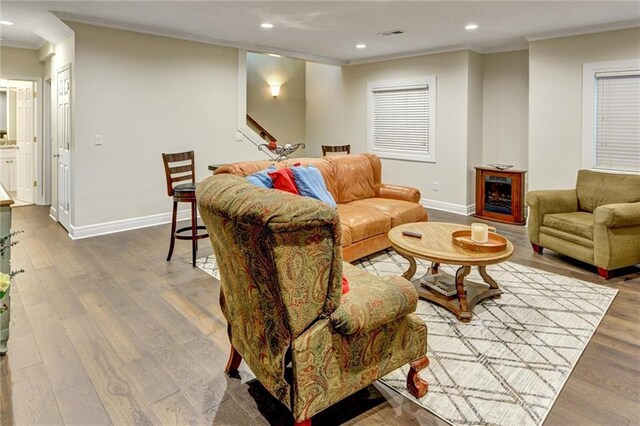 14780 S Glen Eyrie St, Olathe, KS 66061 - living area featuring ornamental molding, recessed lighting, and wood finished floors