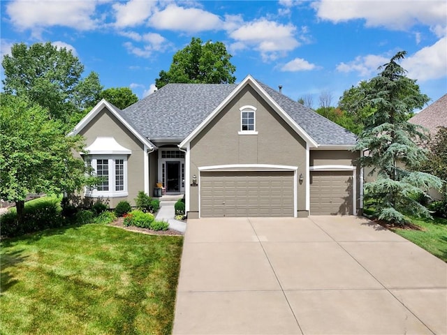 14780 S Glen Eyrie St, Olathe, KS 66061 - view of front of home featuring a front yard, concrete driveway, stucco siding, a shingled roof, and a garage