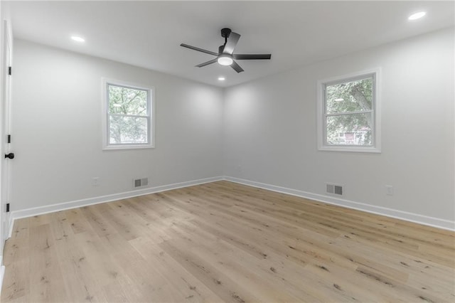 1101 SW Kingscross Rd, Blue Springs, MO 64014 - unfurnished room with light wood-style floors, a ceiling fan, and recessed lighting