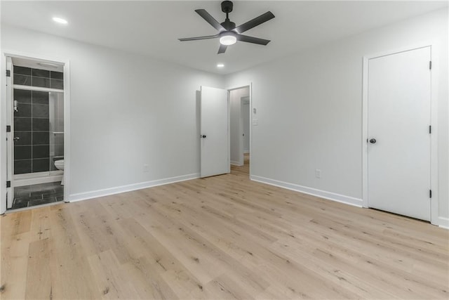 1101 SW Kingscross Rd, Blue Springs, MO 64014 - unfurnished bedroom featuring light wood-style flooring, recessed lighting, connected bathroom, and ceiling fan