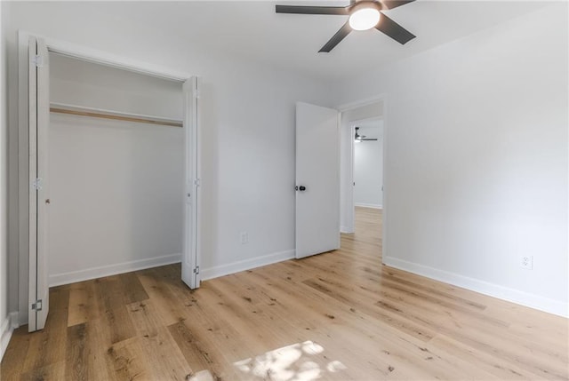 1101 SW Kingscross Rd, Blue Springs, MO 64014 - unfurnished bedroom featuring light wood-type flooring, a ceiling fan, and a closet
