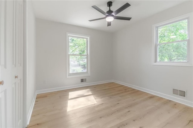1101 SW Kingscross Rd, Blue Springs, MO 64014 - unfurnished room with light wood-style floors and ceiling fan