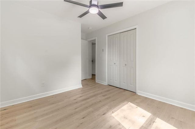 1101 SW Kingscross Rd, Blue Springs, MO 64014 - unfurnished bedroom featuring light wood-style floors, a closet, and ceiling fan