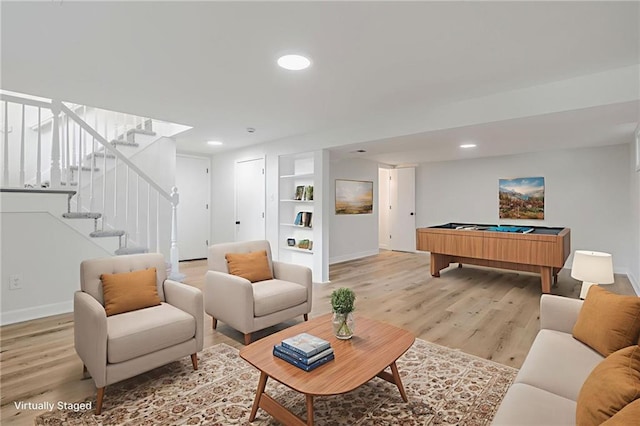 1101 SW Kingscross Rd, Blue Springs, MO 64014 - living area featuring pool table, light wood-style flooring, built in features, stairway, and recessed lighting
