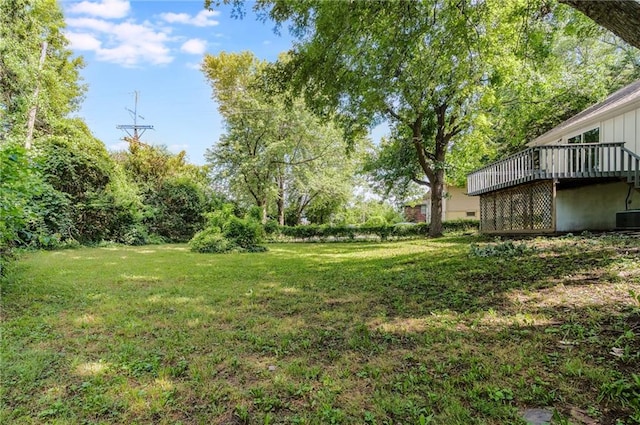 1101 SW Kingscross Rd, Blue Springs, MO 64014 - view of green lawn featuring a deck