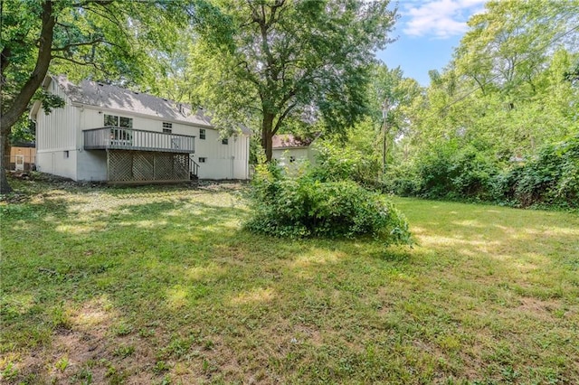 1101 SW Kingscross Rd, Blue Springs, MO 64014 - view of green lawn with a wooden deck