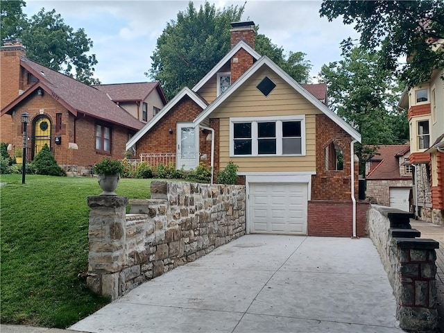 3624 Norledge Ave, Kansas City, MO 64123 - tudor home with concrete driveway, a garage, a front lawn, a chimney, and brick siding