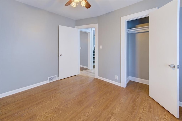 3624 Norledge Ave, Kansas City, MO 64123 - unfurnished bedroom with light wood finished floors, a closet, and ceiling fan