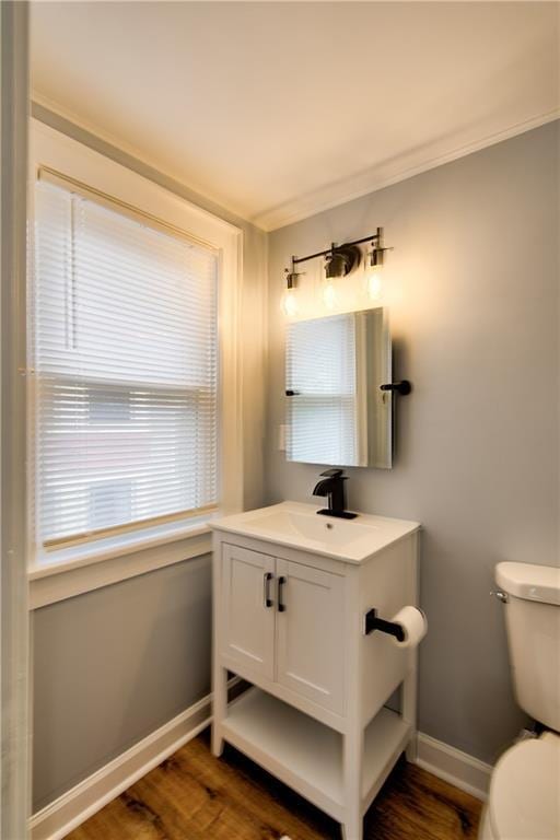 3624 Norledge Ave, Kansas City, MO 64123 - bathroom with vanity and wood finished floors