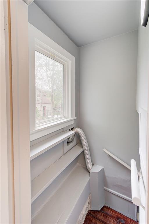 3624 Norledge Ave, Kansas City, MO 64123 - staircase with wood finished floors