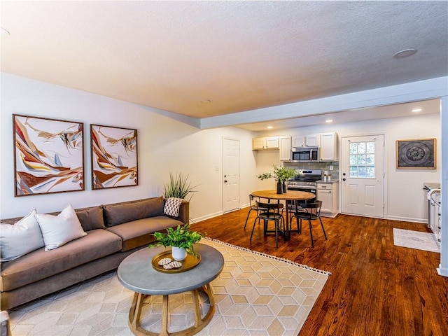 10013 Benson St, Overland Park, KS 66212 - living room featuring dark wood-style flooring and recessed lighting