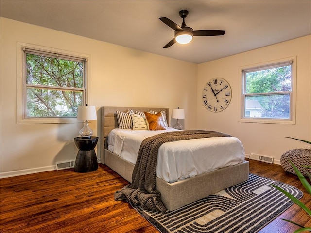 10013 Benson St, Overland Park, KS 66212 - bedroom with dark wood-type flooring and ceiling fan