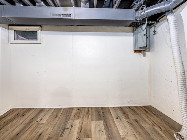 10013 Benson St, Overland Park, KS 66212 - unfinished basement with wood finished floors and electric panel