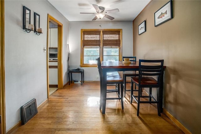 3021 Appleton Ave, Independence, MO 64052 - dining space with a ceiling fan and light wood-type flooring