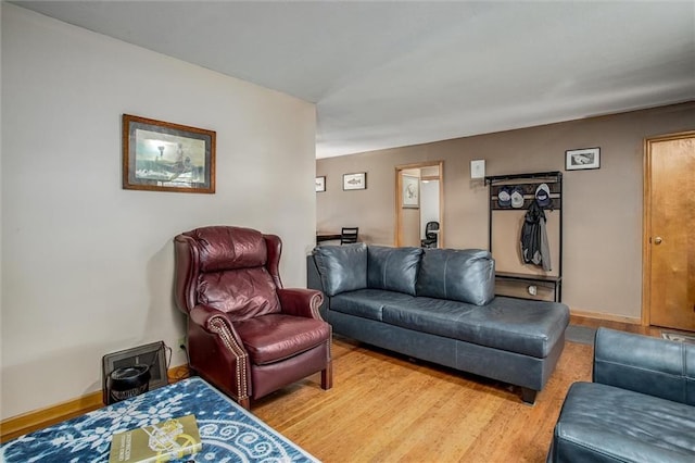3021 Appleton Ave, Independence, MO 64052 - living area with wood finished floors and baseboards