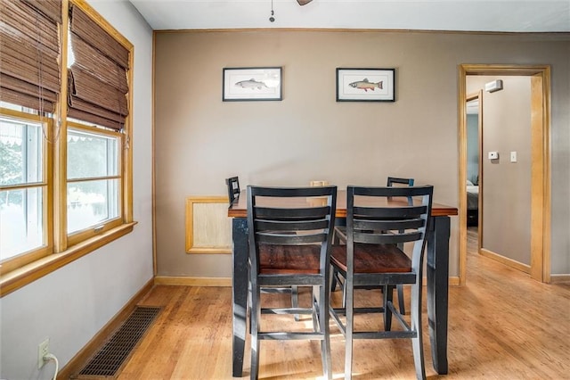 3021 Appleton Ave, Independence, MO 64052 - dining area featuring wood finished floors and baseboards