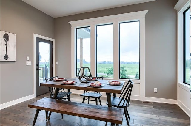 3409 W 187th St, Overland Park, KS 66085 - dining area with dark wood-style floors and baseboards